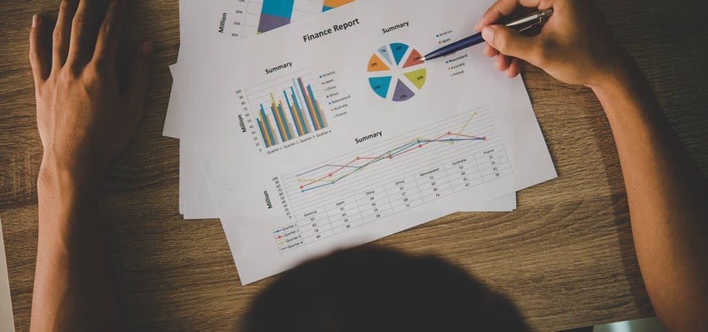 financial-report-graph Person reviewing a graph of financials