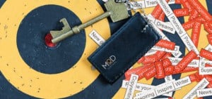 a target with a key pointing towards the middle