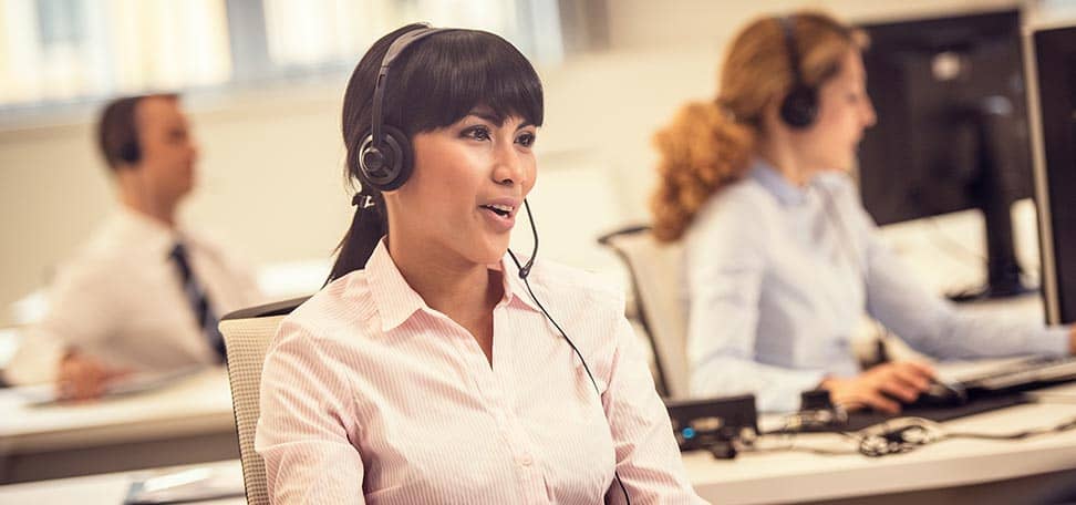 myoutdesk virtual receptionist working with her team